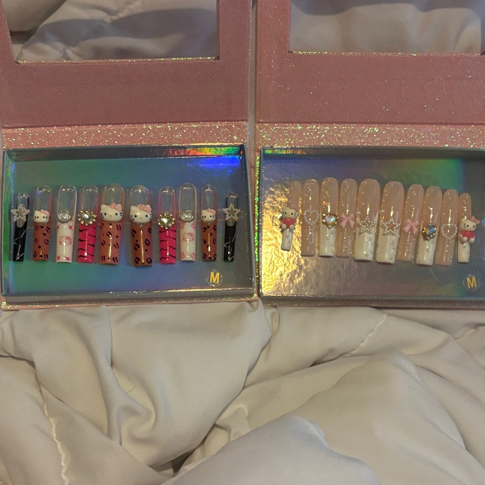 2 sets of xxlong nails. Hello kitty and Sanrio themed